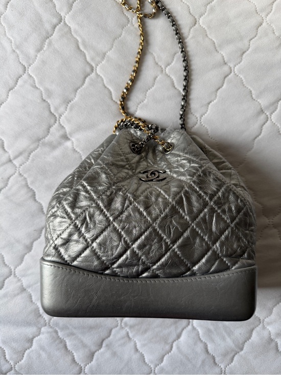 CHANEL Handbags - CHANEL Silver Backpack Quilted Drawstring Shoulder with Mixed Metal Chain